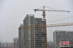 资料图：北京郭公庄一期正在建设中的公租房项目。 中新网记者 金硕 摄 - 江苏新闻网