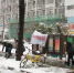 扬州市档案局组织干部职工扫雪清路（图） - 档案局
