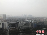 图为江苏扬州上空灰蒙蒙一片。　崔佳明　摄 - 江苏新闻网