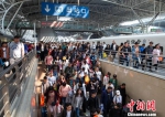 这个国庆节假期，南京站的客流熙熙攘攘。　苏阳 摄 - 江苏新闻网
