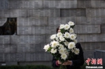 3日，南京大屠杀死难者家庭祭告活动在侵华日军南京大屠杀遇难同胞纪念馆举行。　泱波 摄 - 江苏新闻网