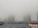 受雾霾影响，南京高楼“隐身”。　杨颜慈　摄 - 新浪江苏