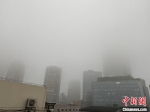 受雾霾影响，南京高楼“隐身”。　杨颜慈 摄 - 新浪江苏