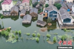 入汛以来，南京市溧水区和凤镇张家社区部分房屋因石臼湖涨水被淹。　泱波　摄 - 江苏新闻网