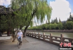 修复治理后的运河沿岸绿地，成为一道亮丽的风景线。　泱波 摄 - 江苏新闻网