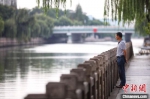 无缝融入民众生活，古运河的清波流淌为城市带来“慢节奏”。　泱波 摄 - 江苏新闻网