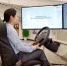 工作人员演示智能驾驶系统。　陆俊　摄 - 江苏新闻网