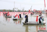 第二十一届中国·盱眙国际龙虾节开捕仪式现场。　许昌银　摄 - 江苏新闻网