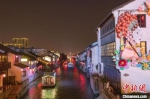 古运河畔的“今夜‘梁’宵”热度颇高。(资料图) 泱波 摄 - 江苏新闻网