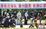 21日，南京各区全员展开核酸检测。　泱波 摄 - 江苏新闻网