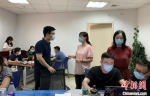 江苏各地赶赴南京的流调人员打响了与病毒争分夺秒的战斗。　江苏省疾控供图 - 江苏新闻网