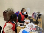 志愿者投身志愿服务工作。浦口区文化和旅游局供图 - 江苏新闻网