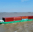 全国首艘120标箱纯电动内河集装箱船在江苏太仓首航。　江苏省交通厅供图 - 江苏新闻网