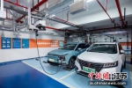 苏州推出全电共享电动汽车充电机器人 国网苏州供电公司供图 - 江苏新闻网