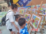 “护苗2022绿书签行动”少儿画展现场。睢城街道供图 - 江苏新闻网