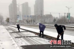 南京雨花台区古雄街道“闻雪而动”保畅通 - 江苏新闻网